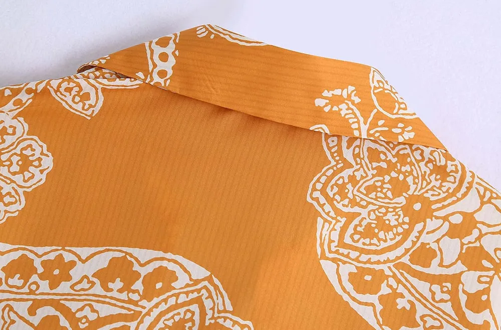 PRINTED TOP WITH KNOT