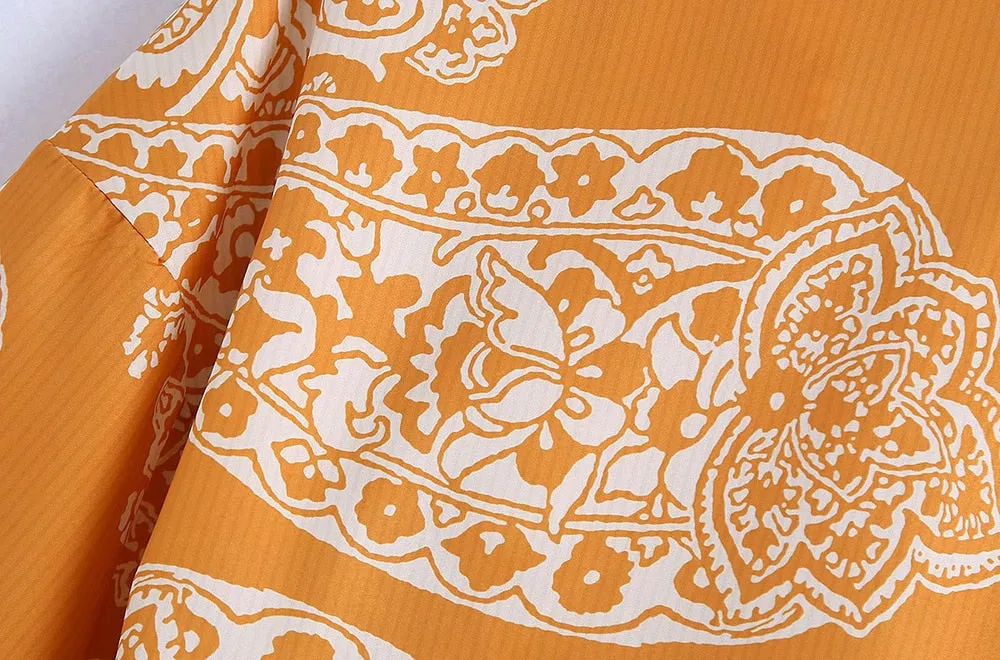 PRINTED TOP WITH KNOT